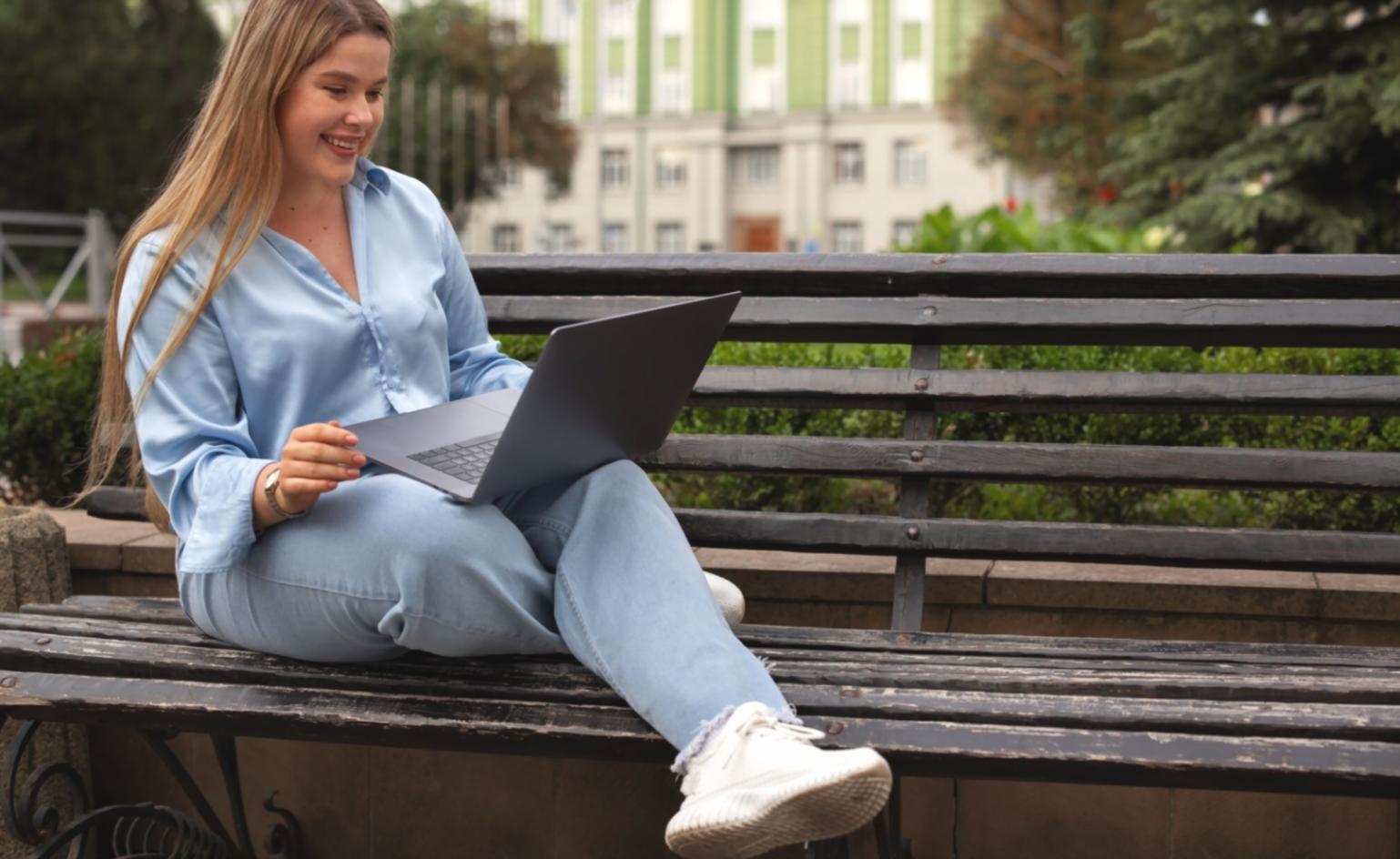 Financial professionals reviewing budget approval workflows on digital screens